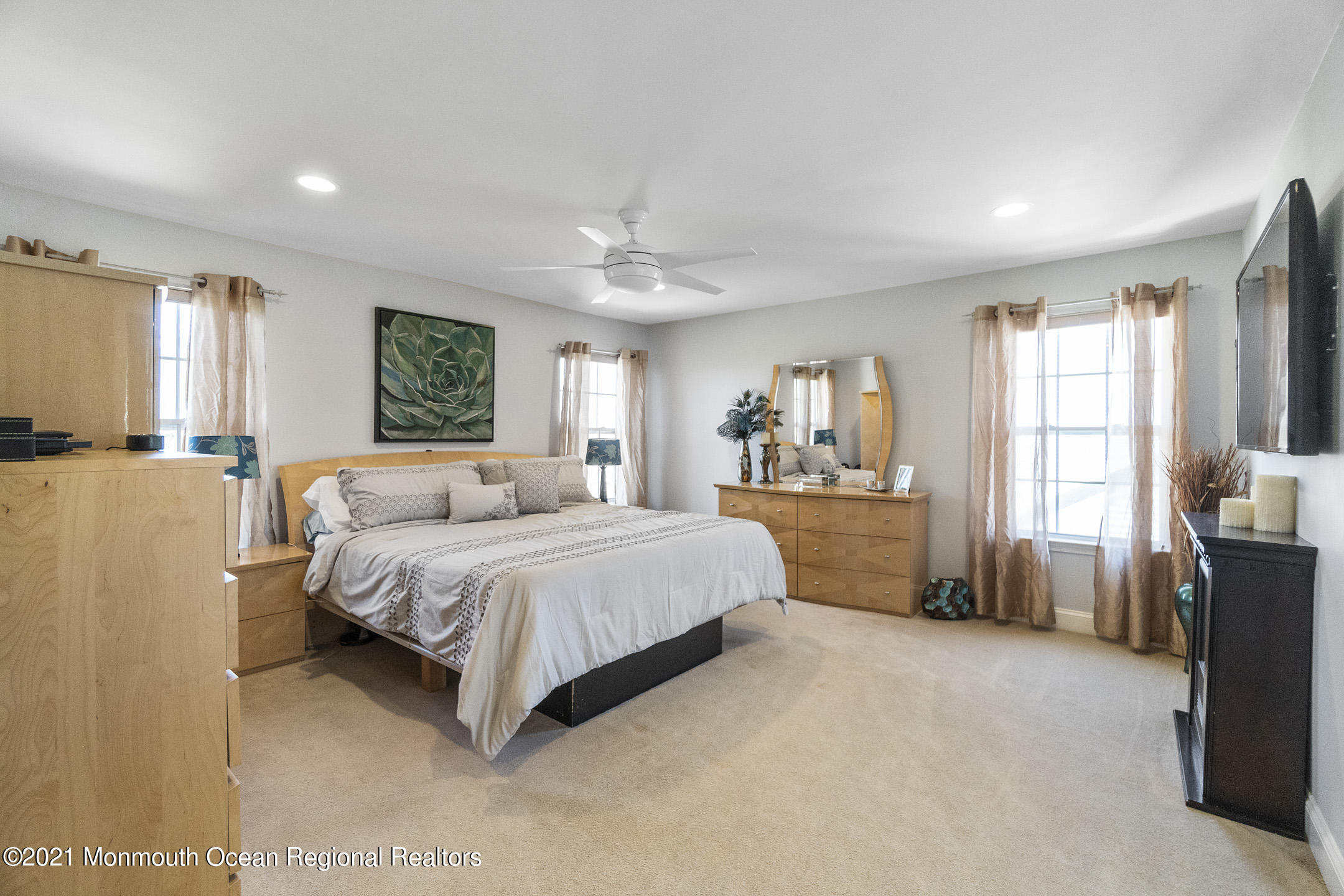 9 Rutgers Drive Howell, NJ 07731 - Photo 33 of 45 a spacious bedroom with a large bed and a window