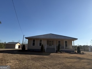 142 Wilson Way Musella, GA 31066 - Photo 28 of 39 a front view of a house with yard