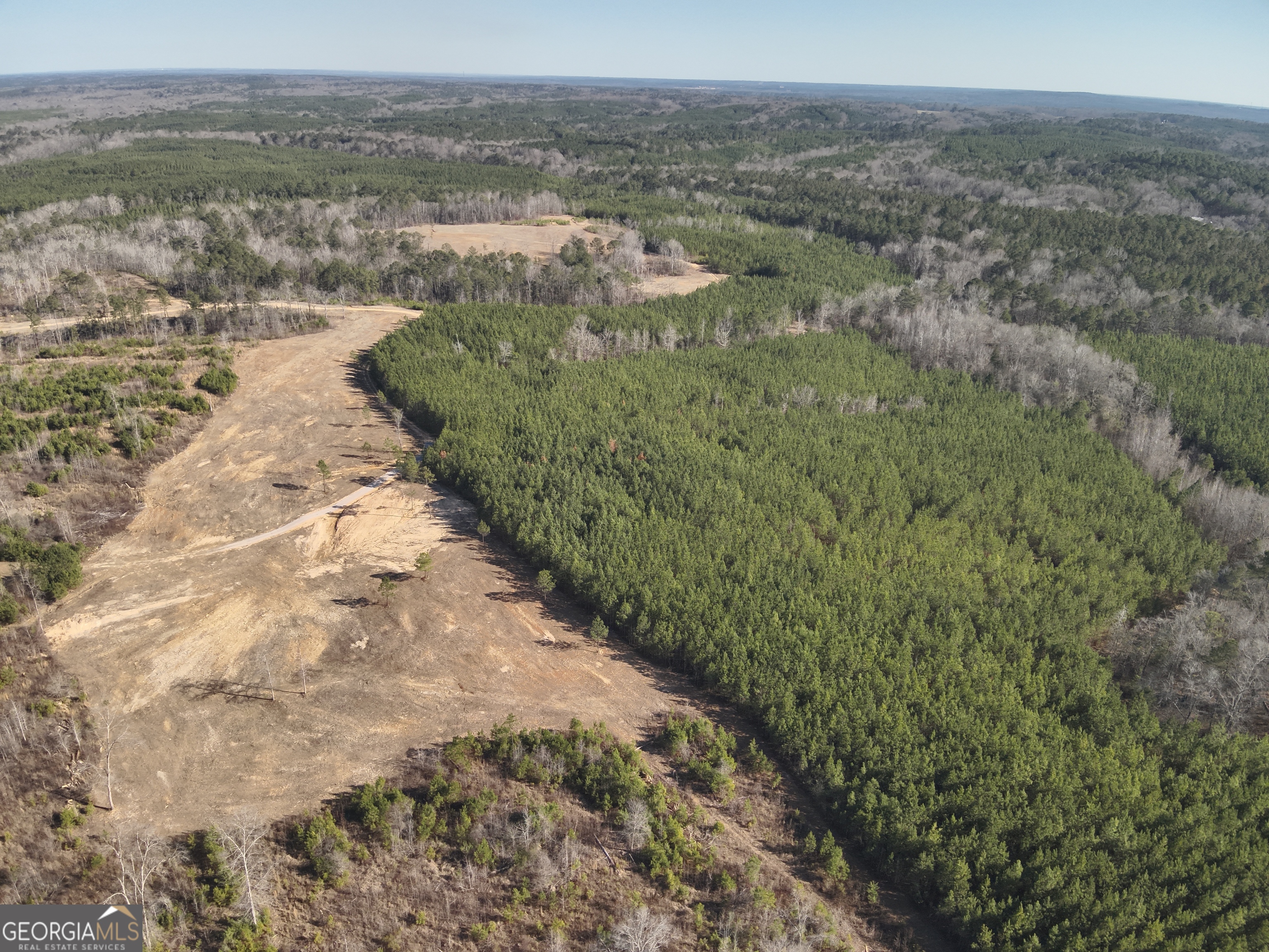 142 Wilson Way Musella, GA 31066 - Photo 3 of 39 a view of a lake with mountains in background