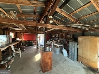 142 Wilson Way Musella, GA 31066 - Photo 31 of 39 a view of a room with wooden chairs