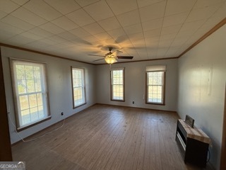 142 Wilson Way Musella, GA 31066 - Photo 35 of 39 a view of livingroom with hardwood floor and window