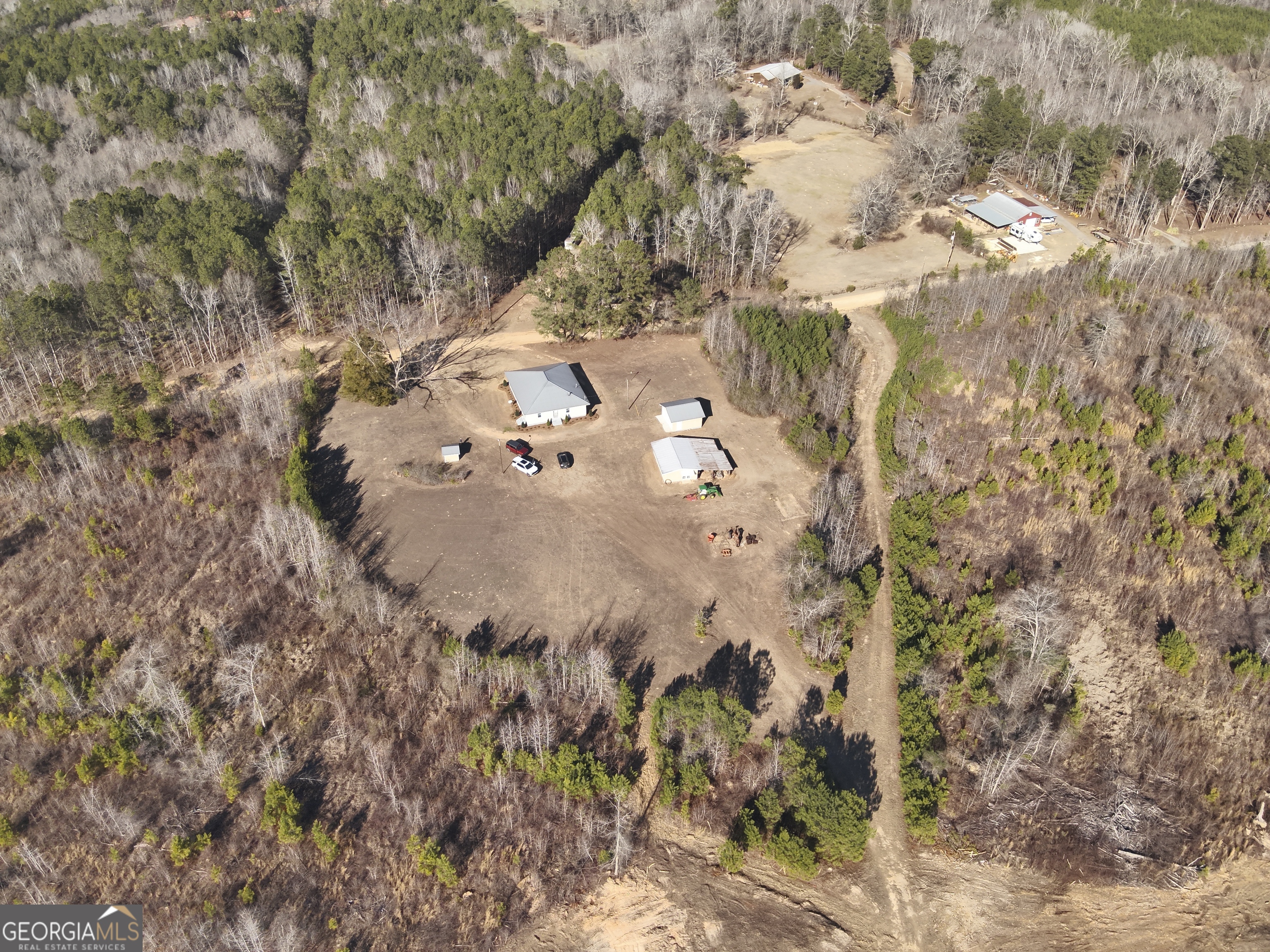 142 Wilson Way Musella, GA 31066 - Photo 6 of 39 a view of a yard with trees