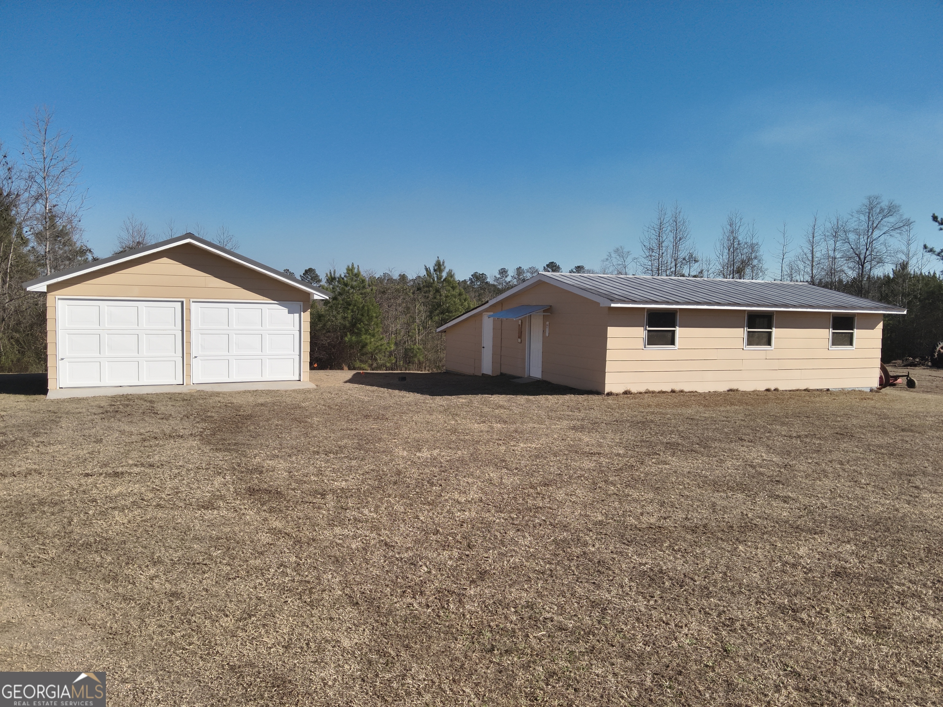 142 Wilson Way Musella, GA 31066 - Photo 8 of 39 a view of a house with a yard