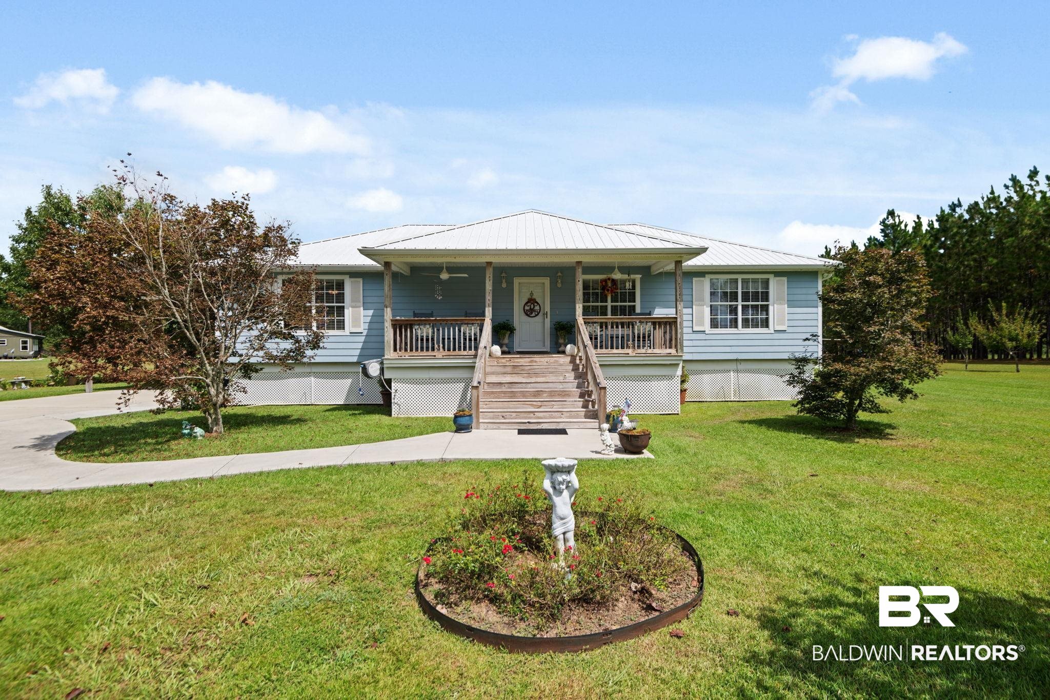 25871 Goat Cooper Road Robertsdale, AL 36567 - Photo 2 of 40 Single story home featuring a front lawn and covered porch