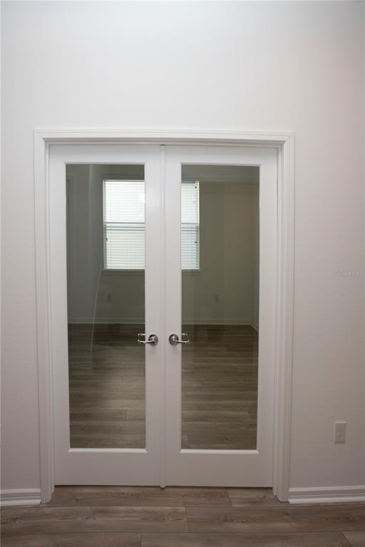14184 Hammock Crest Way Riverview, FL 33569 - Photo 20 of 59 a view of wooden door