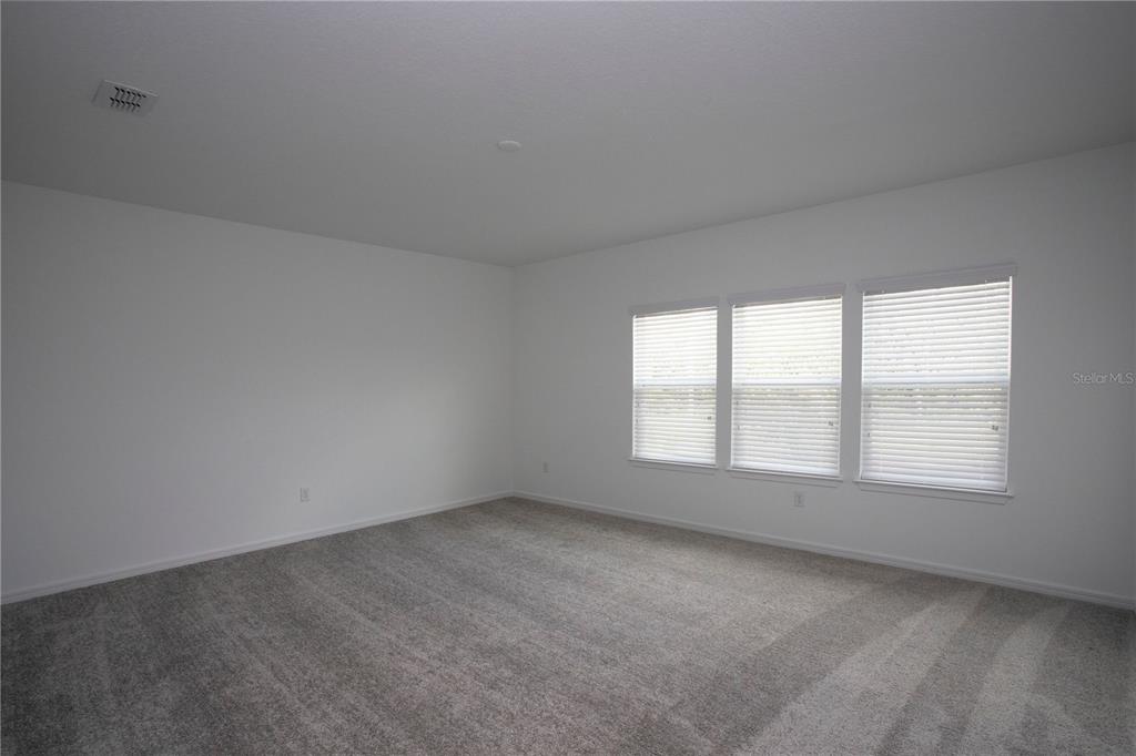 14184 Hammock Crest Way Riverview, FL 33569 - Photo 49 of 59 an empty room with a window