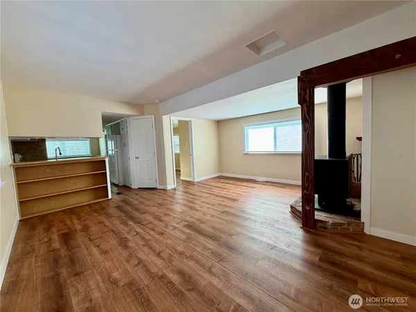 a view of room with wooden floor and chair