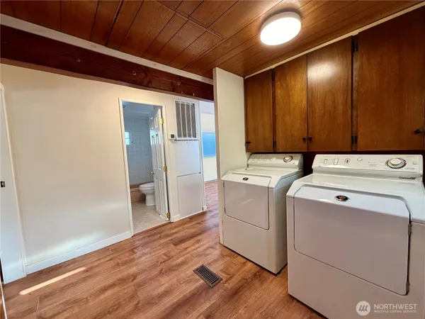 a view of a storage & utility room with washer and dryer