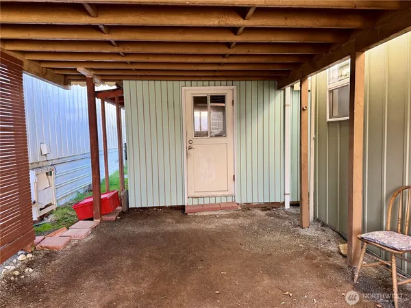 an entryway with a room