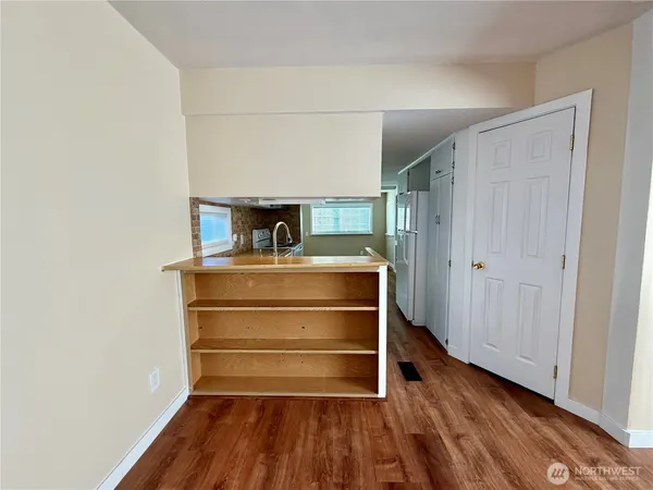 a room with storage and utility room