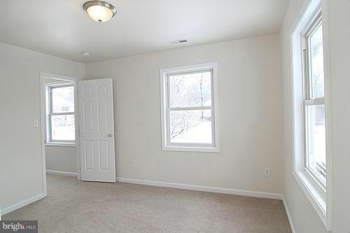 6304 Ford Road Frederick, MD 21702 - Photo 14 of 29 an empty room with windows