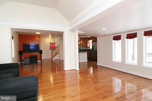 6304 Ford Road Frederick, MD 21702 - Photo 8 of 29 a living room with furniture and kitchen view with wooden floor