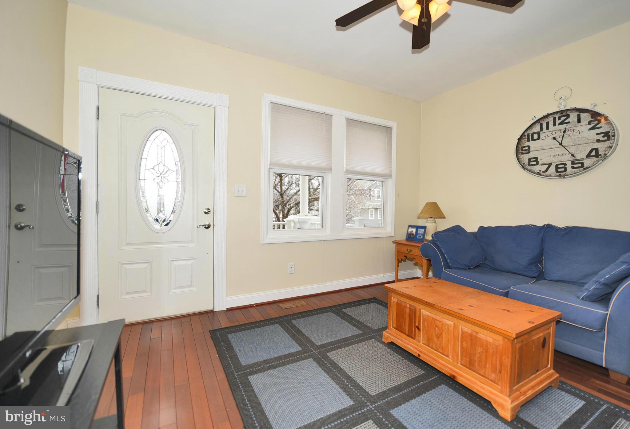 710 Elmwood Road Baltimore, MD 21206 - Photo 2 of 30 a living room with furniture and a window