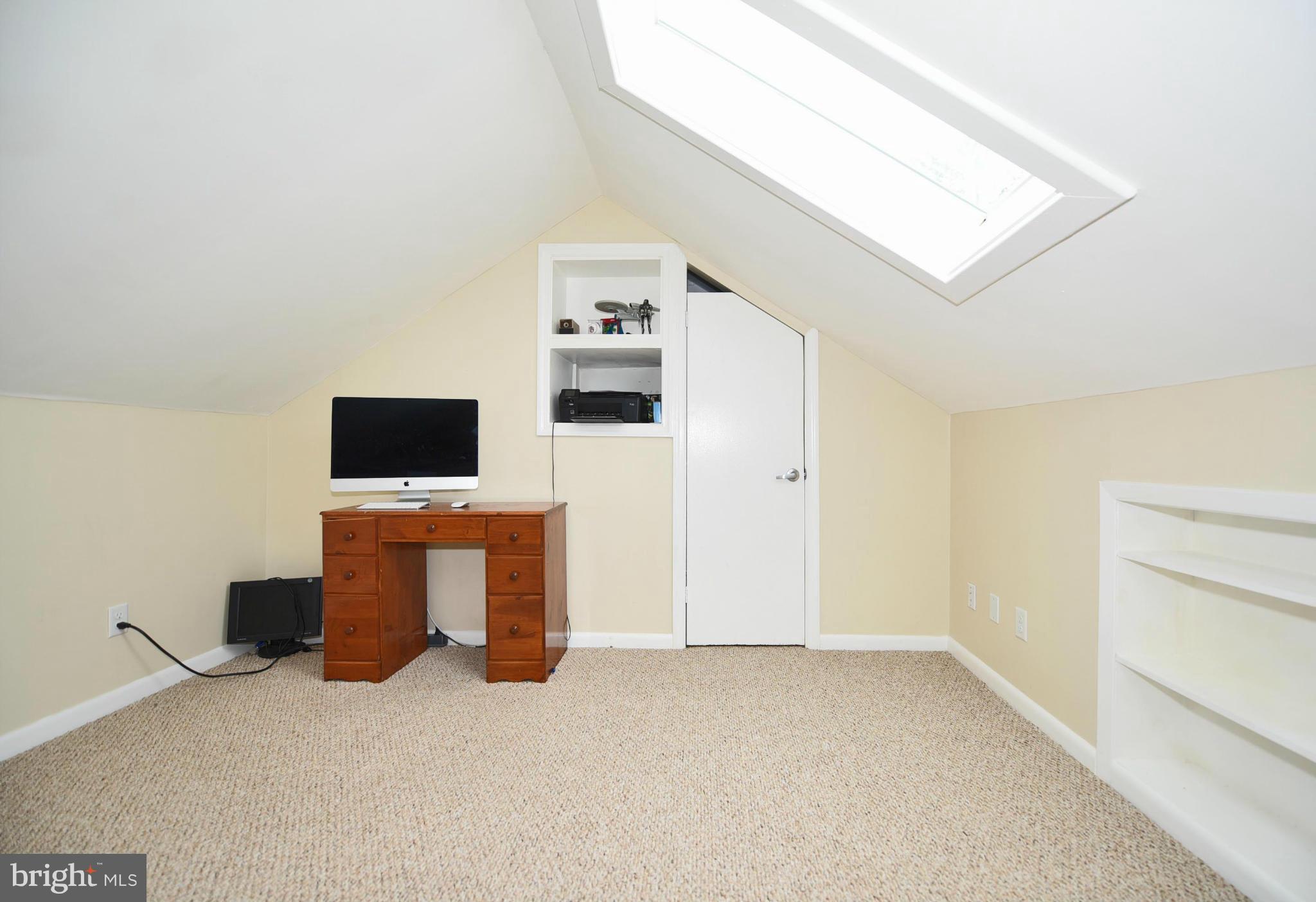 710 Elmwood Road Baltimore, MD 21206 - Photo 18 of 30 a living room with furniture and a flat screen tv
