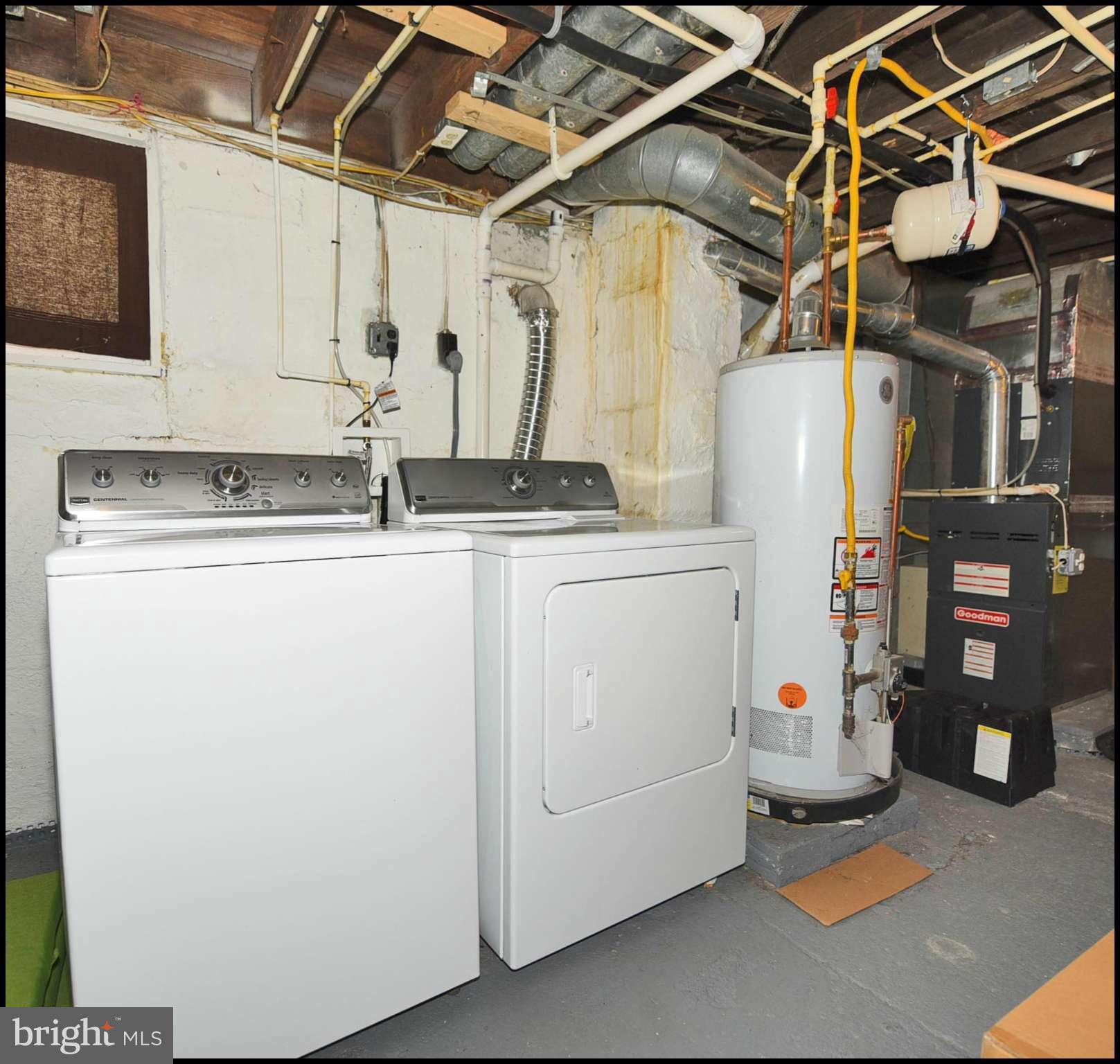 710 Elmwood Road Baltimore, MD 21206 - Photo 30 of 30 a utility room with dryer and washer