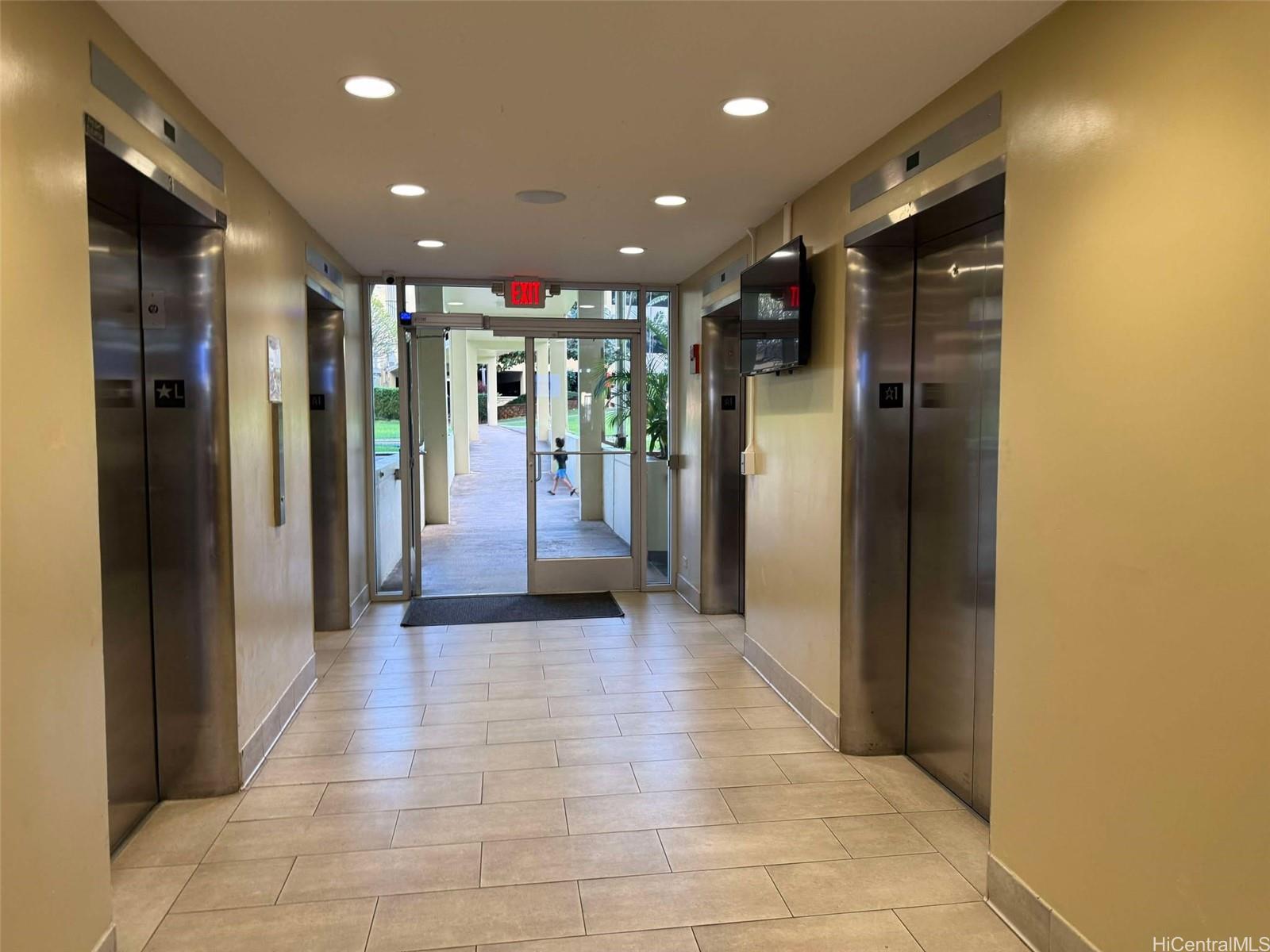 3161 Ala Ilima Street, Unit 202 Honolulu, HI 96818 - Photo 14 of 18 a view of hallway with a living room