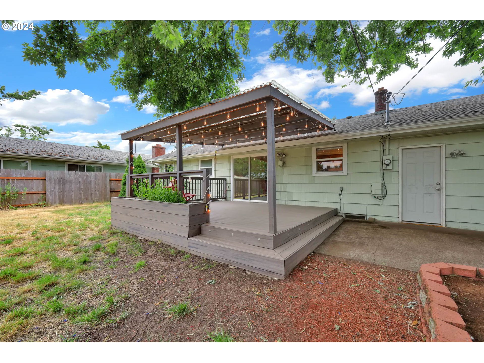 1452 N Street Springfield, OR 97477 - Photo 29 of 30 a view of a house with a yard