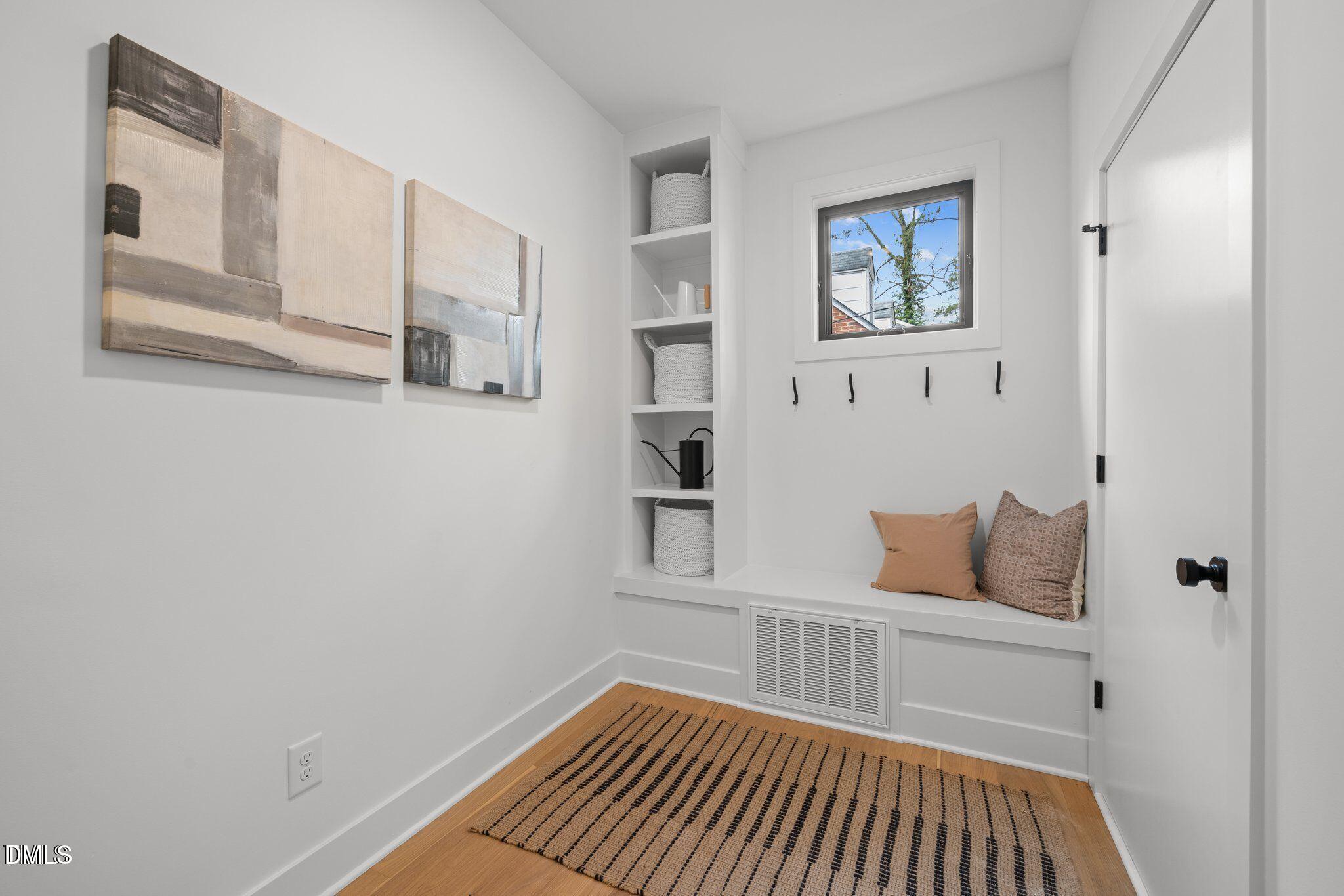 516 Edgecreek Court Raleigh, NC 27604 - Photo 22 of 26 a bedroom with a bed and the wall painting