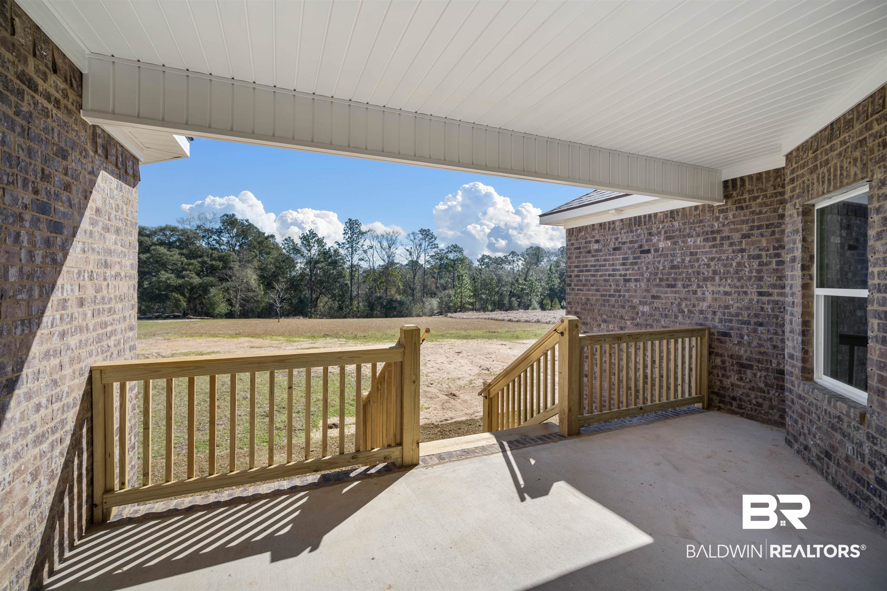 188 Hampton Ridge Mobile, AL 36608 - Photo 32 of 37 Large 15' x 20' covered back porch perfect for entertaining.