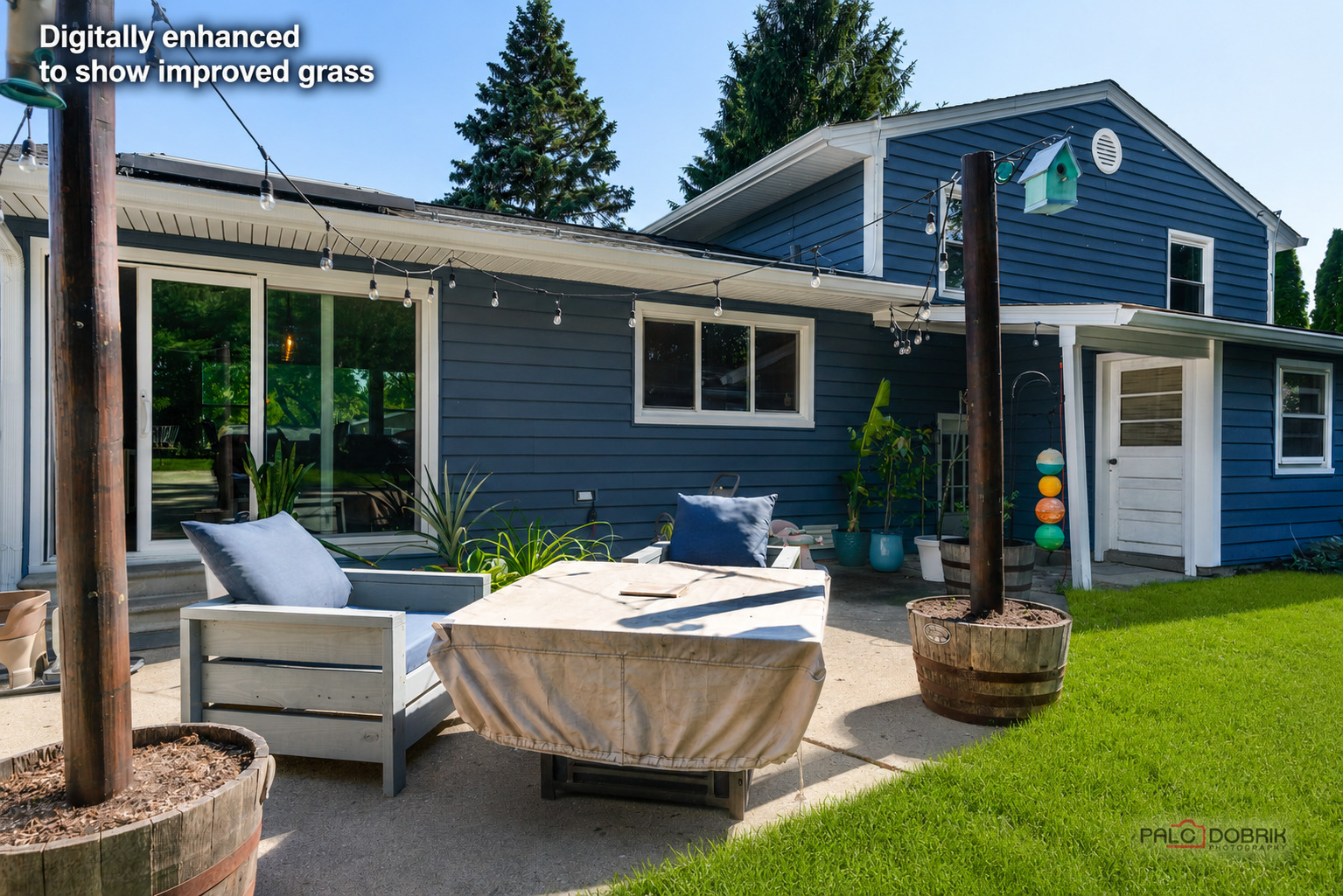 489 1st Street Antioch, IL 60002 - Photo 27 of 33 a view of a house with backyard sitting area and garden