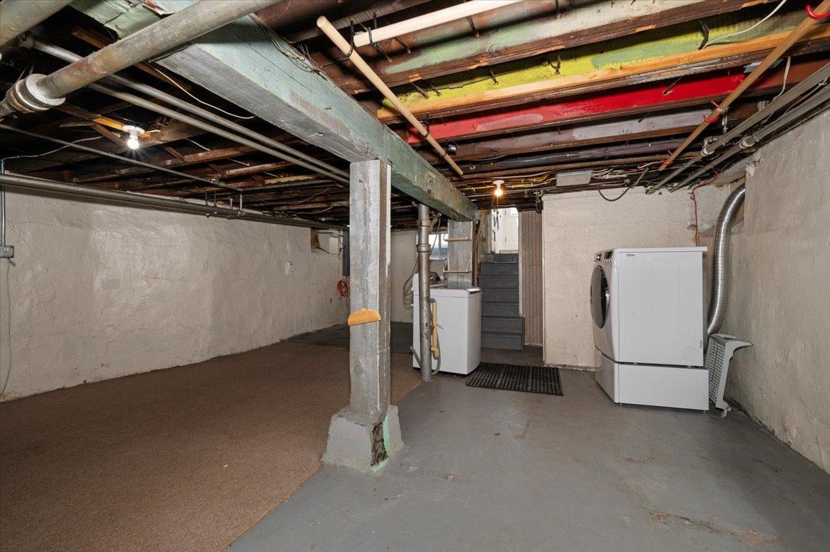 2127 Tower Avenue Superior, WI 54880 - Photo 26 of 39 Unfinished basement with washer and clothes dryer and stairs