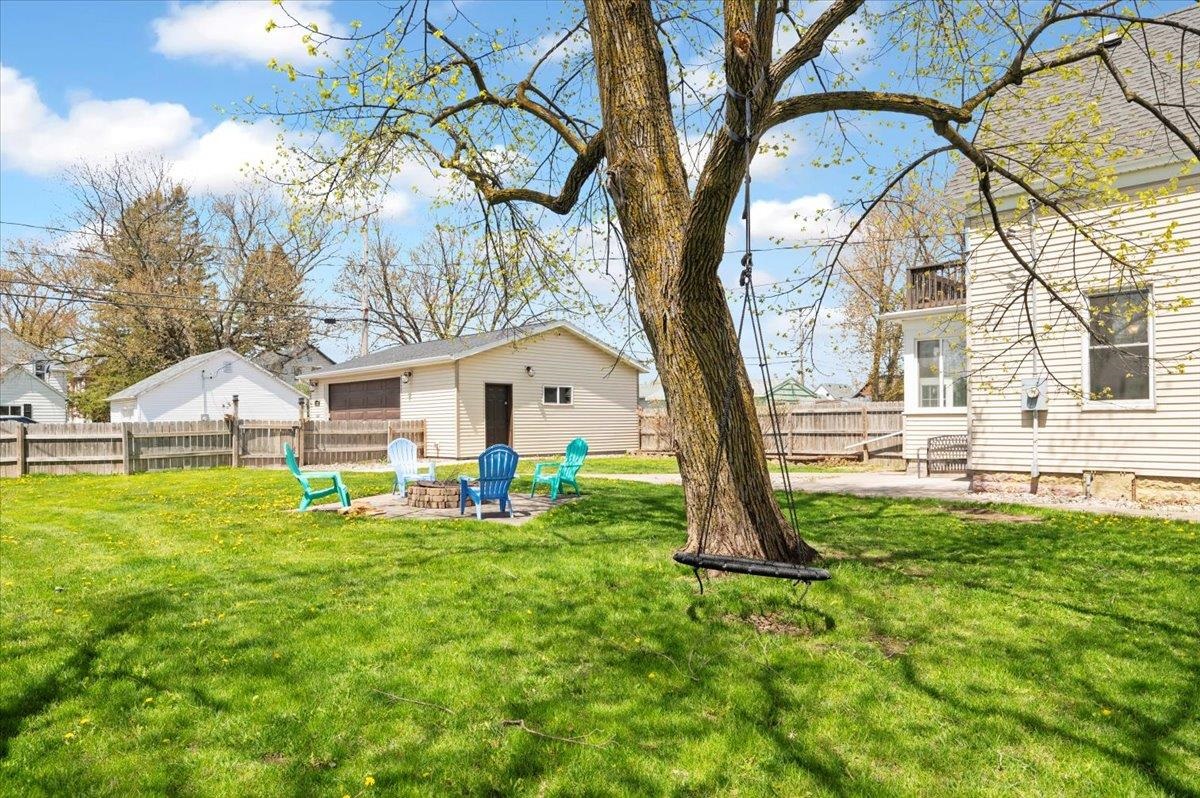 2127 Tower Avenue Superior, WI 54880 - Photo 30 of 39 View of yard featuring an outdoor fire pit and a patio area