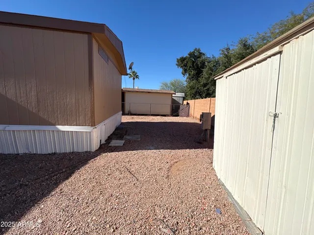 a view of a back yard of the house