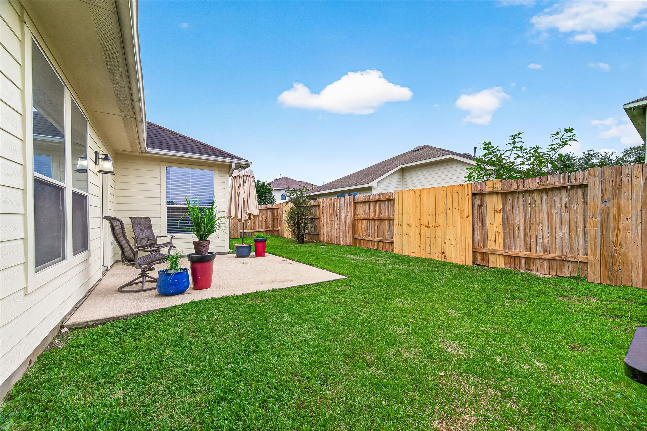 7415 Riven Oaks Court Cypress, TX 77433 - Photo 39 of 42 Spacious backyard offers a blank canvas for outdoor entertaining, gatherings, gardening, or creating your own private retreat.