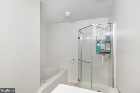 a bathroom with a sink double vanity and a mirror