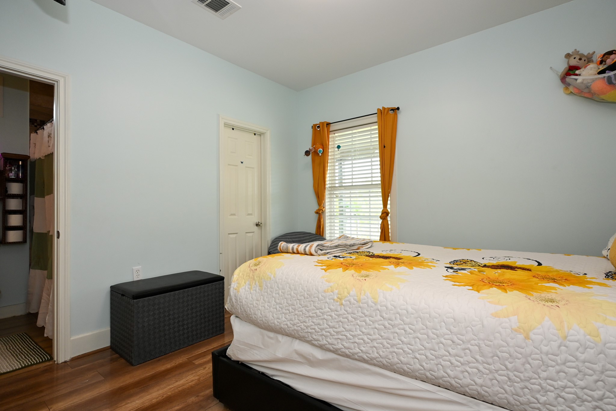 1229 County Road 2209N Cleveland, TX 77327 - Photo 13 of 43 a bedroom with a bed and a window