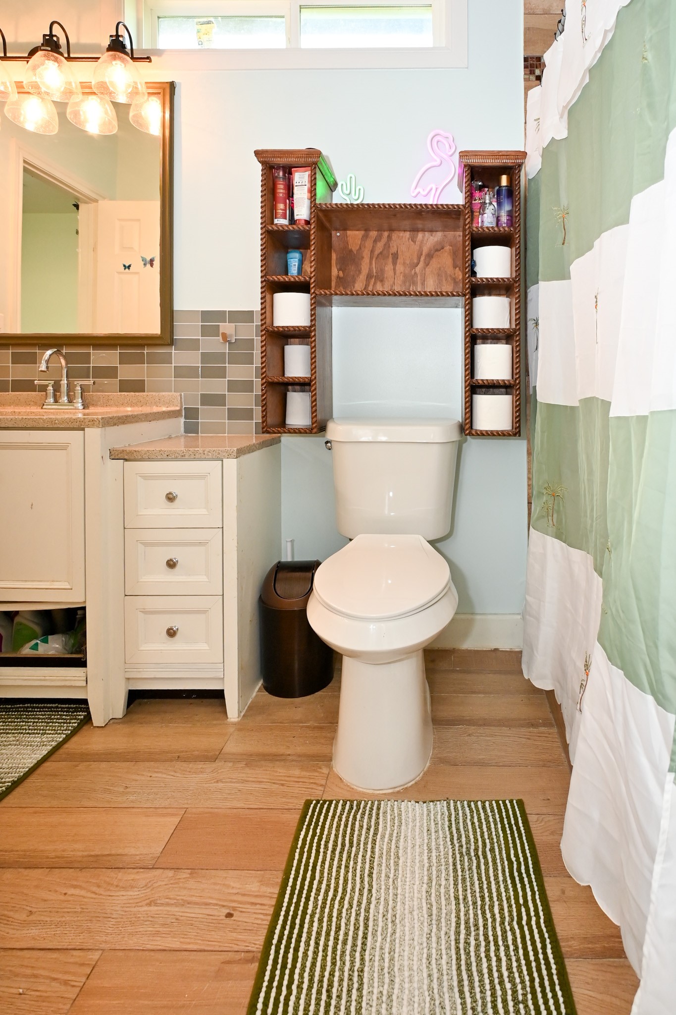 1229 County Road 2209N Cleveland, TX 77327 - Photo 14 of 43 a bathroom with a sink toilet and shower