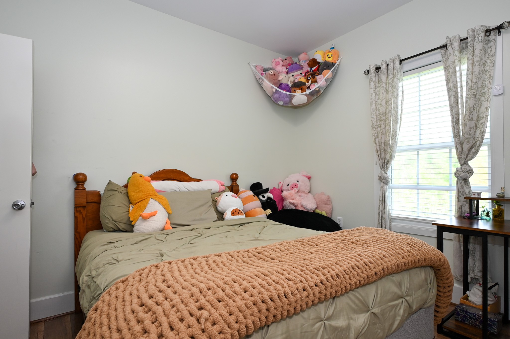 1229 County Road 2209N Cleveland, TX 77327 - Photo 18 of 43 a bedroom with a bed and a window