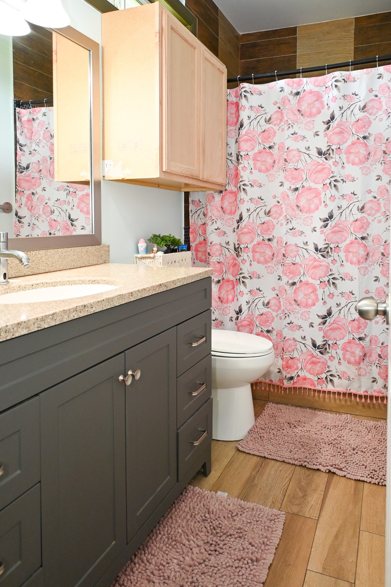 1229 County Road 2209N Cleveland, TX 77327 - Photo 22 of 43 a bathroom with a sink and a toilet