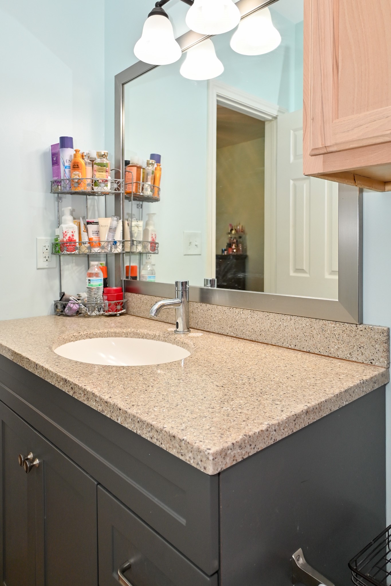 1229 County Road 2209N Cleveland, TX 77327 - Photo 23 of 43 a bathroom with a granite countertop sink and a mirror