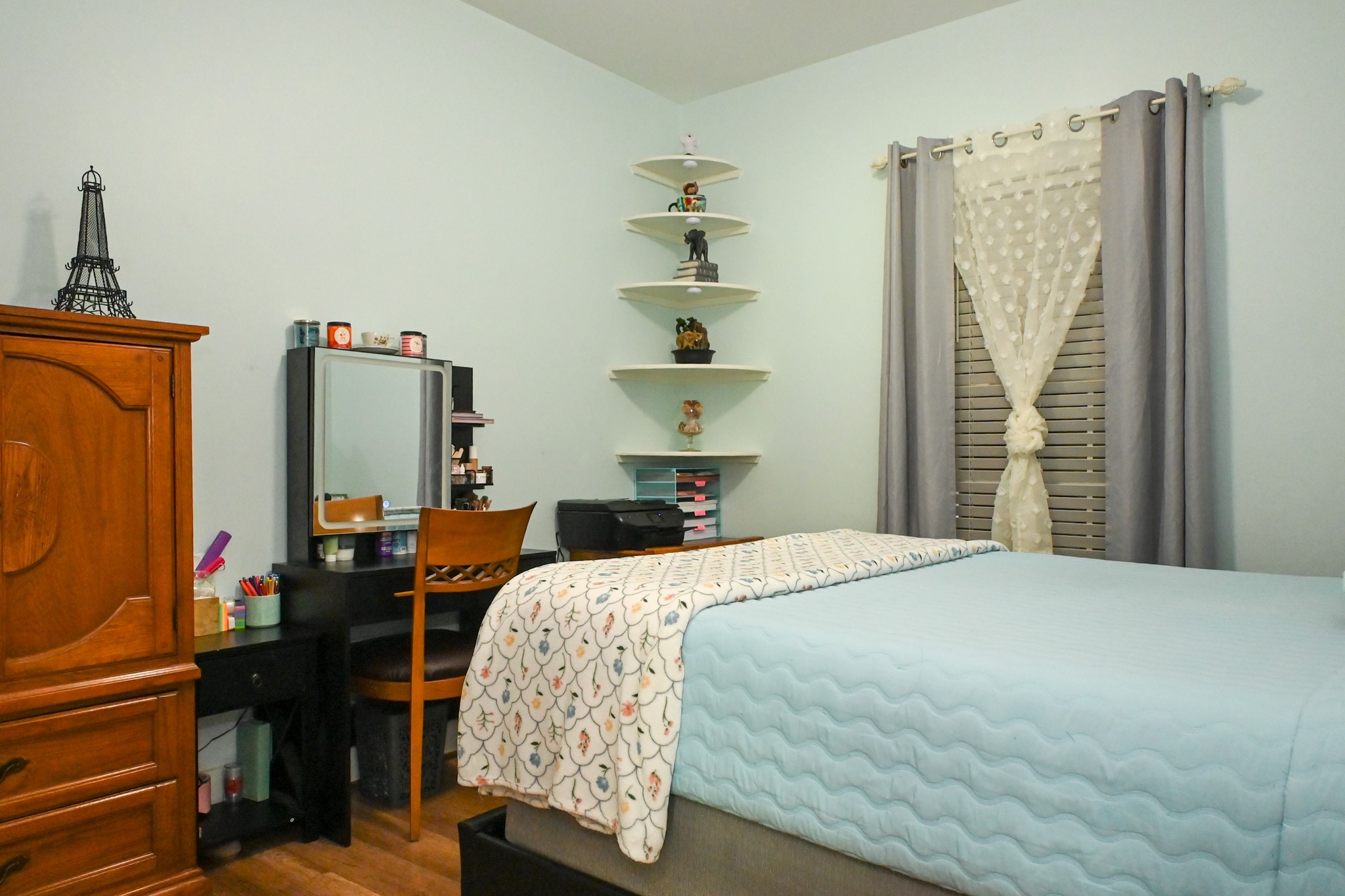 1229 County Road 2209N Cleveland, TX 77327 - Photo 25 of 43 a bedroom with a bed dresser and a window