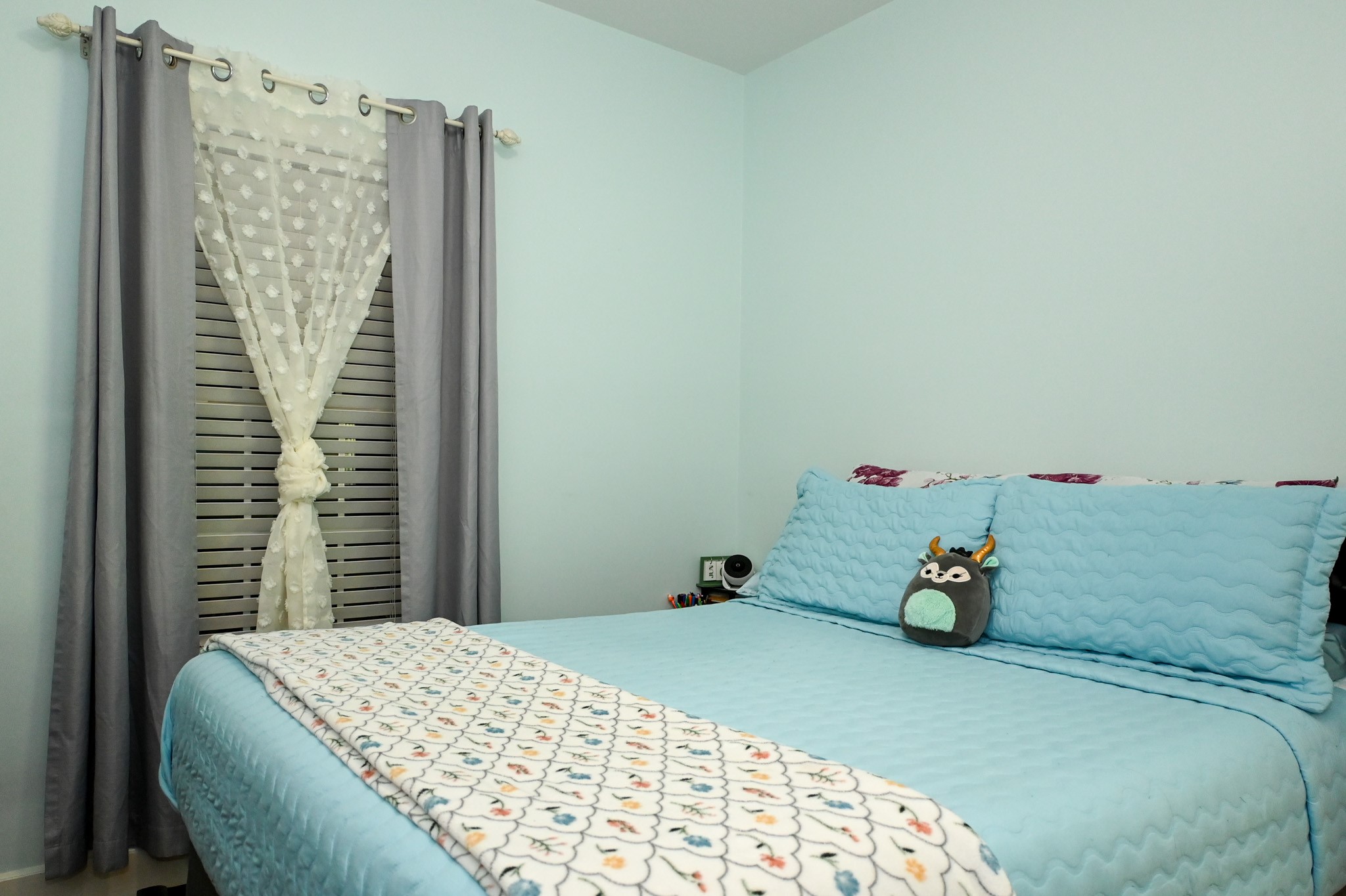 1229 County Road 2209N Cleveland, TX 77327 - Photo 26 of 43 a bedroom with a bed and a window