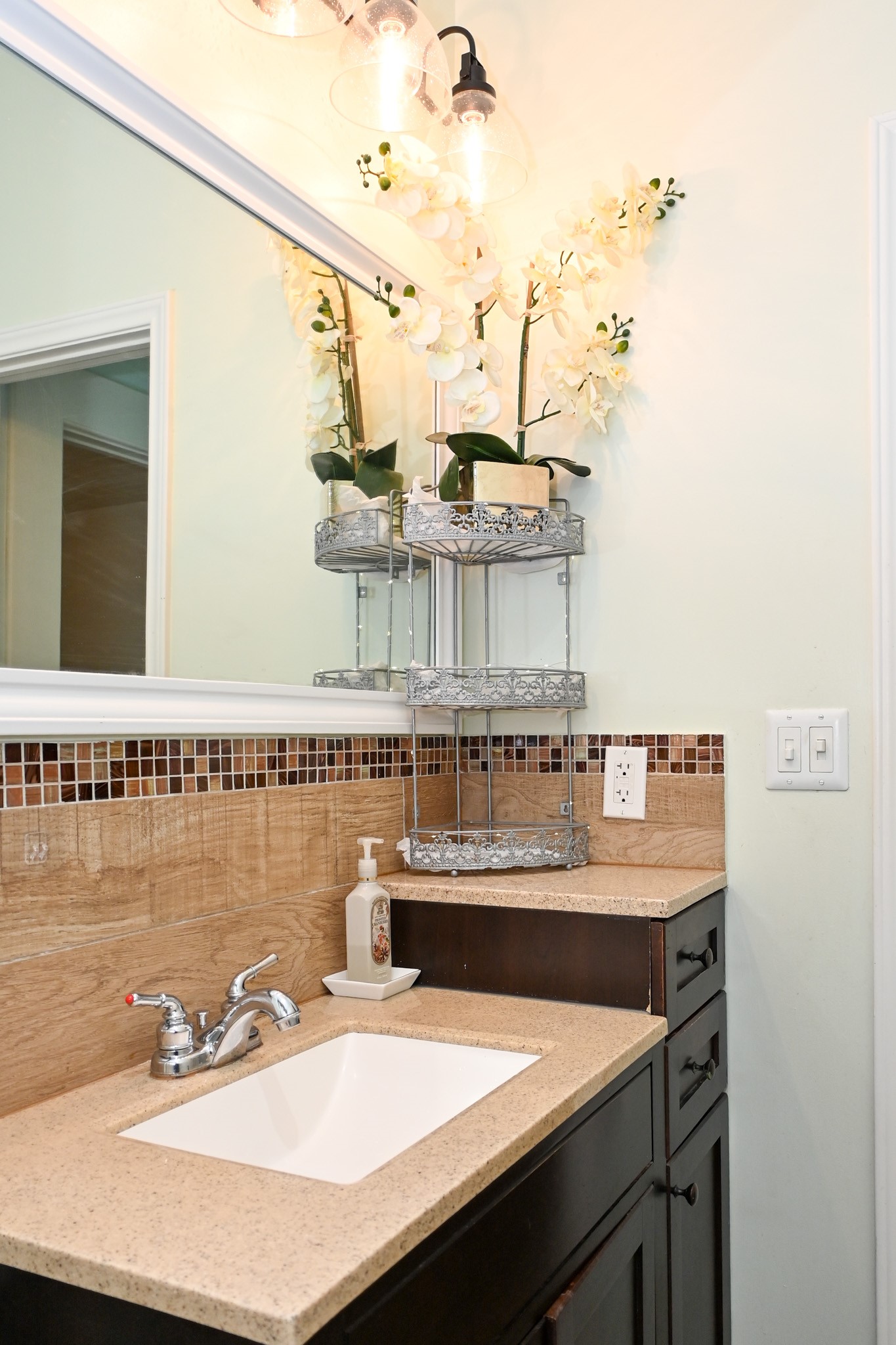 1229 County Road 2209N Cleveland, TX 77327 - Photo 31 of 43 a bathroom with a sink vanity and a mirror
