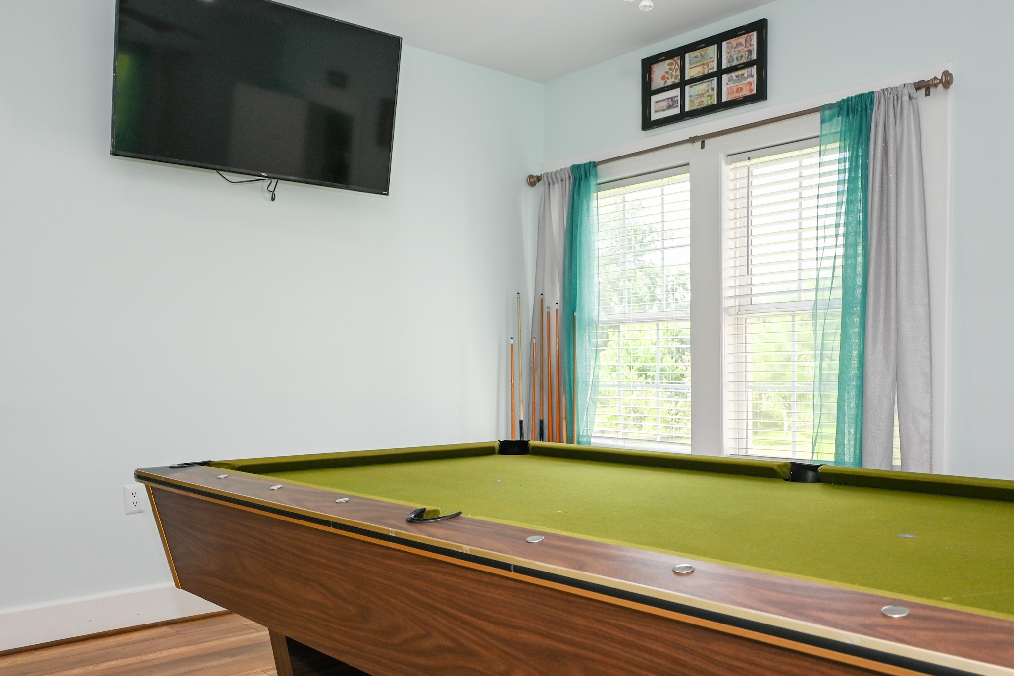 1229 County Road 2209N Cleveland, TX 77327 - Photo 33 of 43 a room with pool table and windows