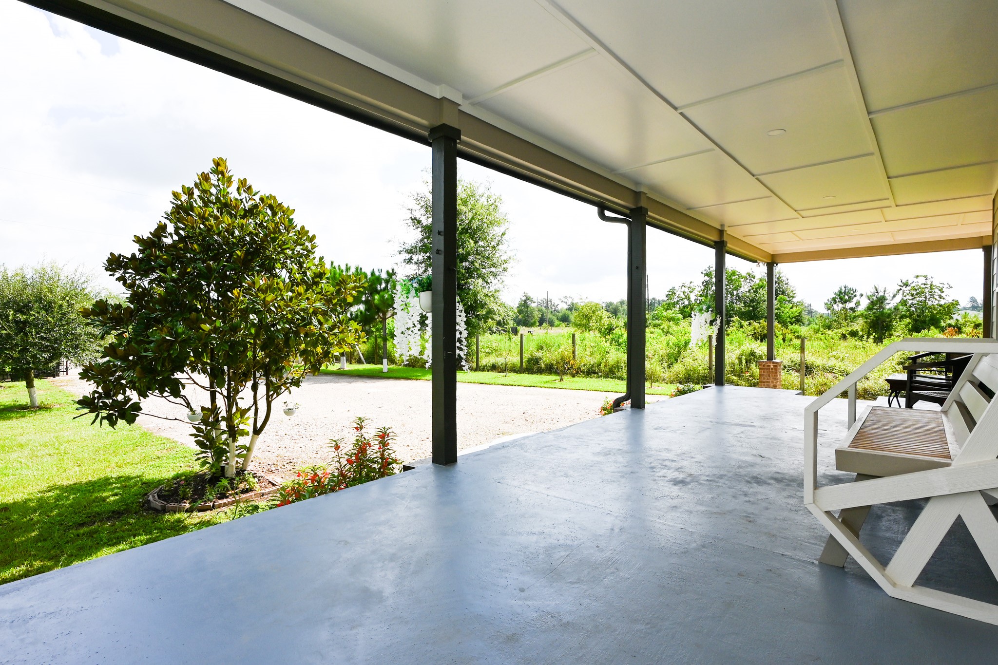 1229 County Road 2209N Cleveland, TX 77327 - Photo 4 of 43 a view of outdoor space with seating area