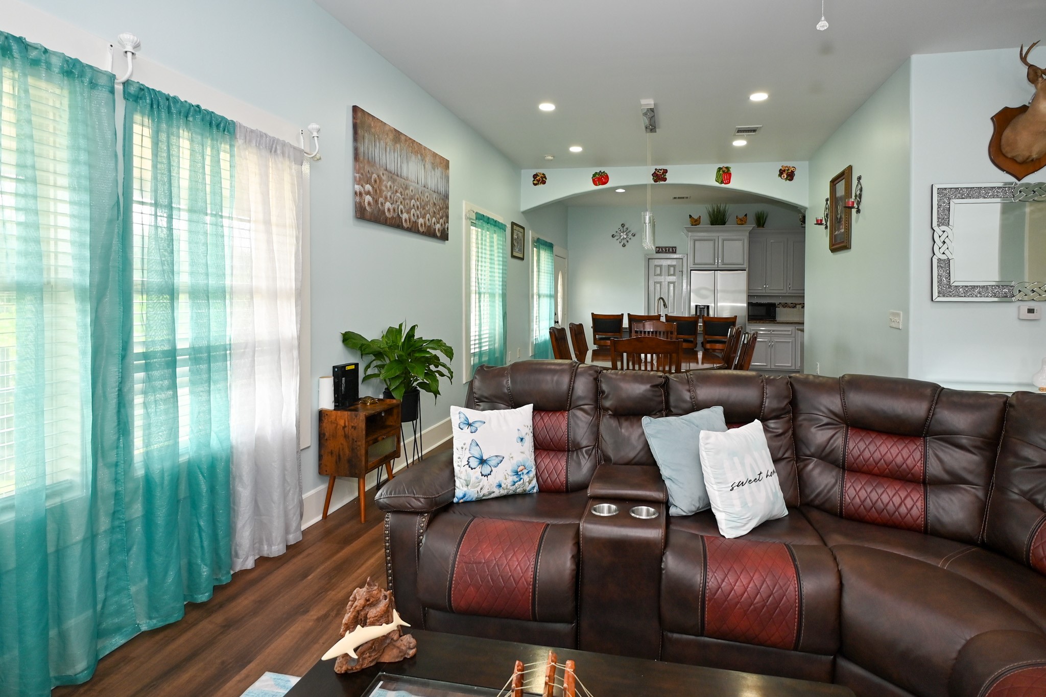 1229 County Road 2209N Cleveland, TX 77327 - Photo 8 of 43 a living room with furniture and a large window