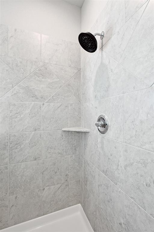 808 Feather Edge Drive Springtown, TX 76082 - Photo 28 of 40 a bathroom with a shower
