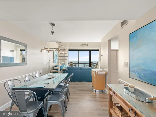 a view of a dining room with furniture