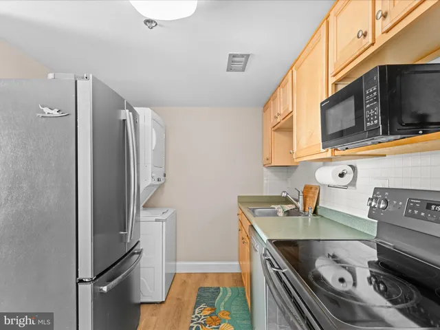 a kitchen with a stove and a microwave
