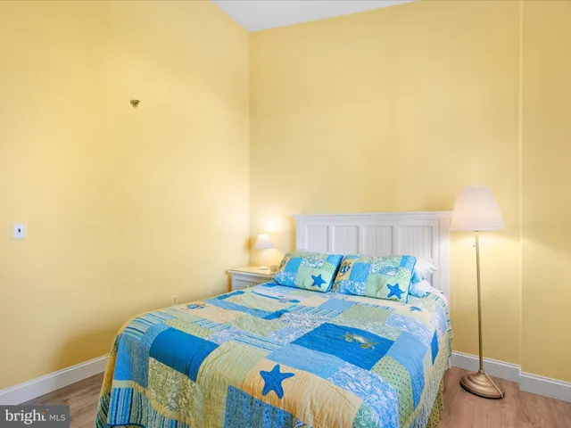 a bedroom with a bed and a cabinets