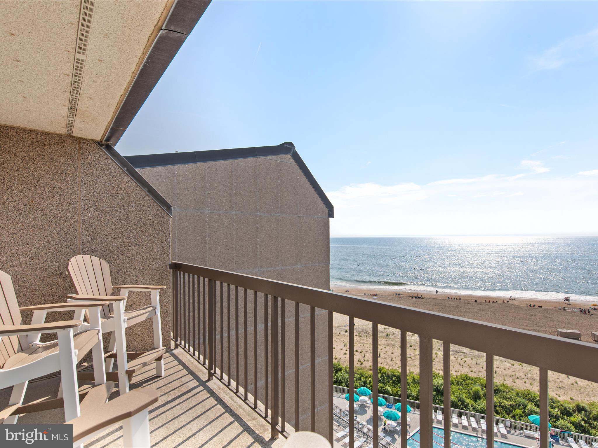 Ph03 Ph03 Farragut House Road, Unit PH03 Bethany Beach, DE 19930 - Photo 41 of 45 a view of roof deck with wooden floor and fence