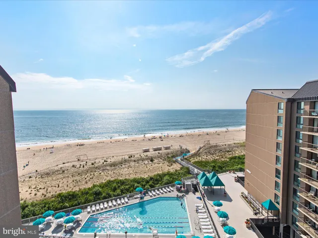 a view of a balcony with ocean view