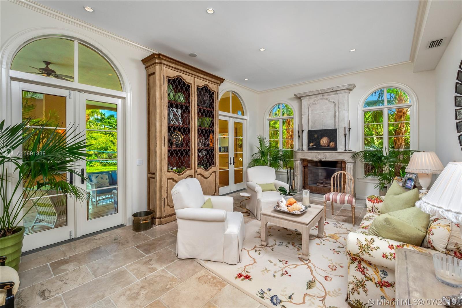 441 Island Drive Key Biscayne, FL 33149 - Photo 14 of 47 FORMAL LIVING ROOM WITH FIREPLACE
