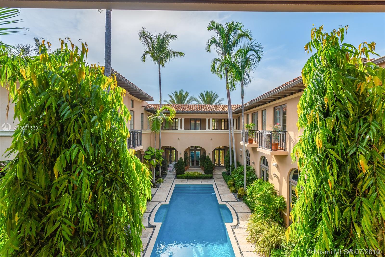 441 Island Drive Key Biscayne, FL 33149 - Photo 3 of 47 LOOKING TOWARDS MAIN HOUSE FROM GUEST QUARTERS