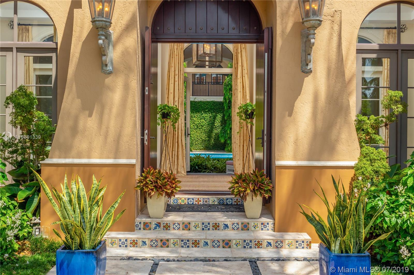 441 Island Drive Key Biscayne, FL 33149 - Photo 4 of 47 FRONT DOOR OPENS TO POOL VIEW