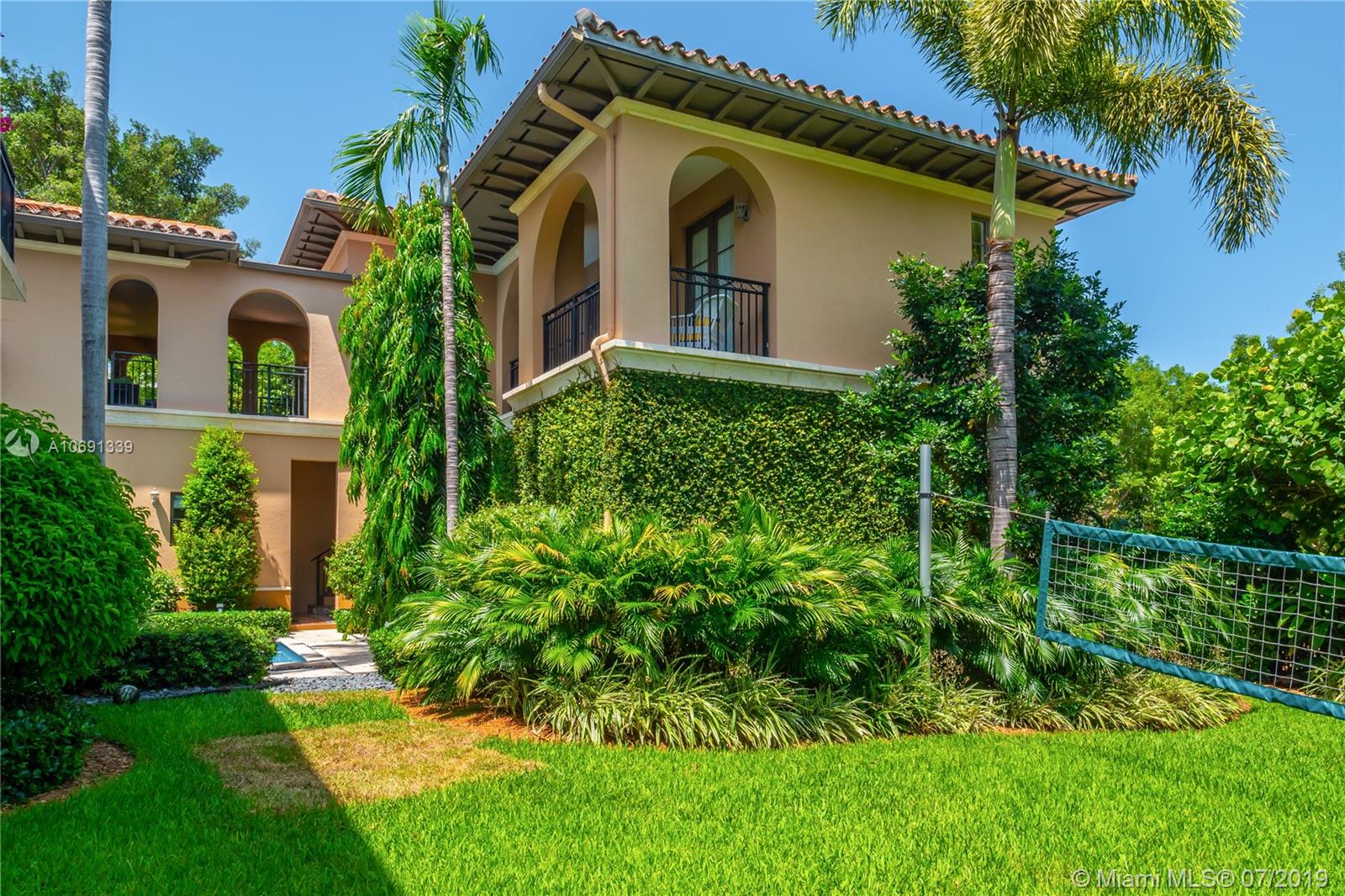 441 Island Drive Key Biscayne, FL 33149 - Photo 42 of 47 SIDE YARD LOOKING AT THE UPSTAIRS GUEST QUARTERS